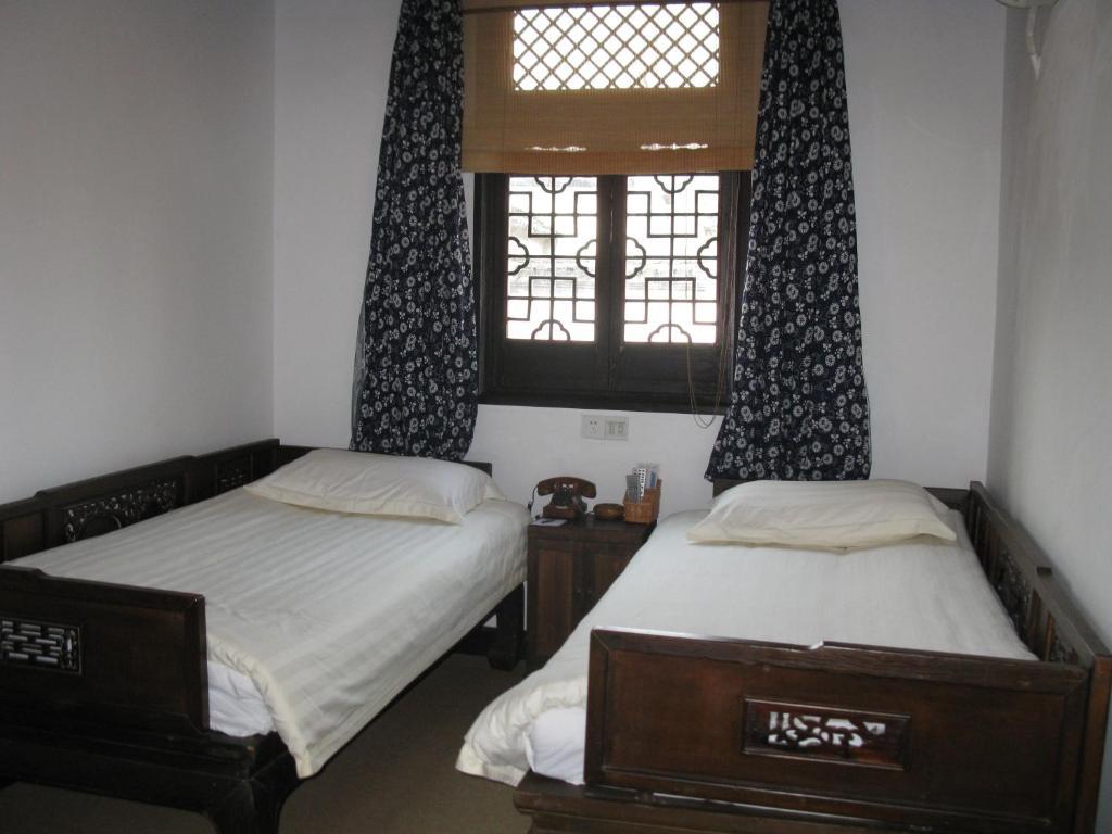 XI Di Travel Lodge Yi (Anhui) 객실 사진